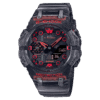 Reloj Casio G-Shock esfera negra y exterior transparente con toques rojos en ambas partes.