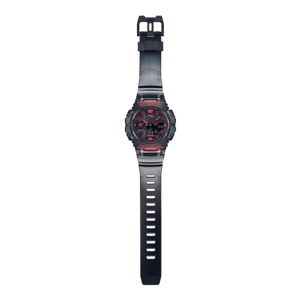 Reloj Casio G-Shock esfera negra y exterior transparente con toques rojos en ambas partes.