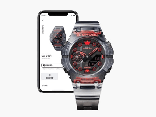 Reloj Casio G-Shock esfera negra y exterior transparente con toques rojos en ambas partes.