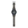 Reloj Casio G-Shock GA-100TU-1A3ER esfera negra y exterior beige.