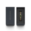 Reloj Daniel Wellington esfera en verde con toques dorados y exterior dorado.
