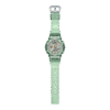 Reloj Casio G-Shock esfera dorada y exterior verde transparente.