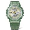 Reloj Casio G-Shock esfera dorada y exterior verde transparente.