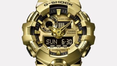 Reloj Casio G-Shock con esfera de color dorado toques negros y correa en color negro.